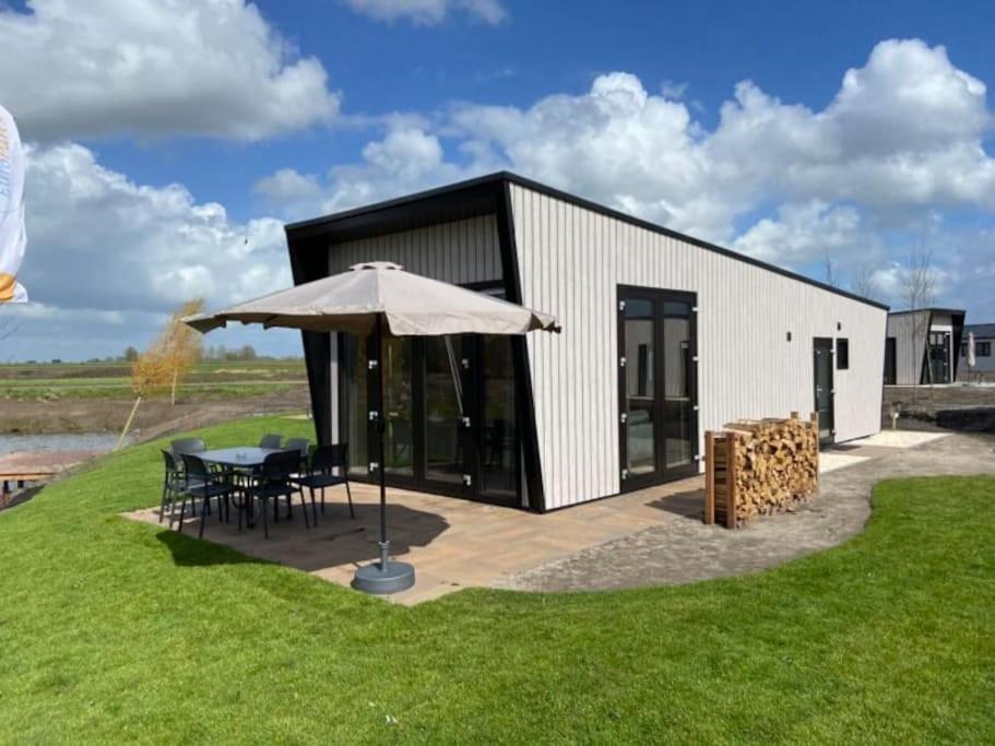 Tiny Vakantiehuis Aan Het Water Met Eigen Steiger En Airco กัมเปิน ภายนอก รูปภาพ